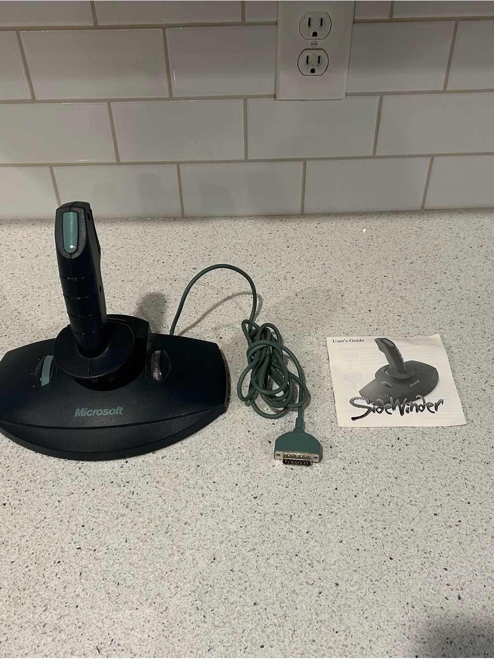 Microsoft SideWinder Joystick in Teal and Black with manual